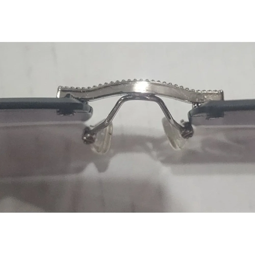 Womens silver snake embellished rimless fashionable sunglasses uv protection